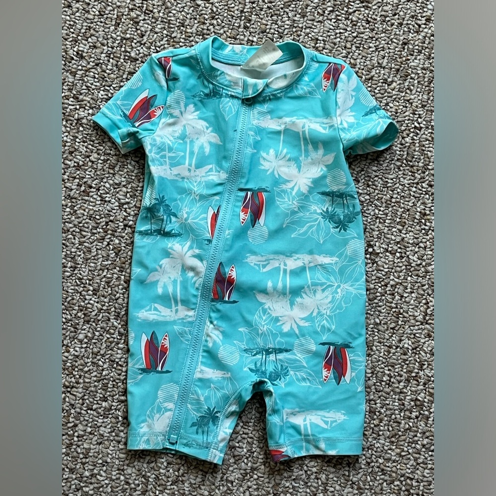 OshKosh b’gosh surfboard and palm tree swimwear. 6m
